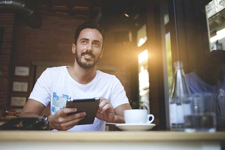 male-tablet-coffee