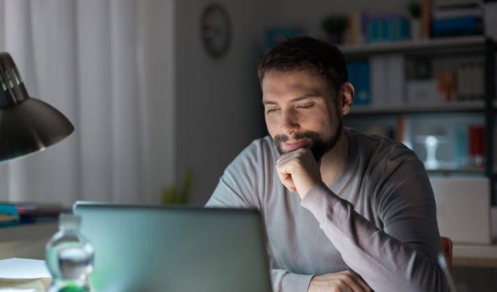 male-reading-a-writing-piece