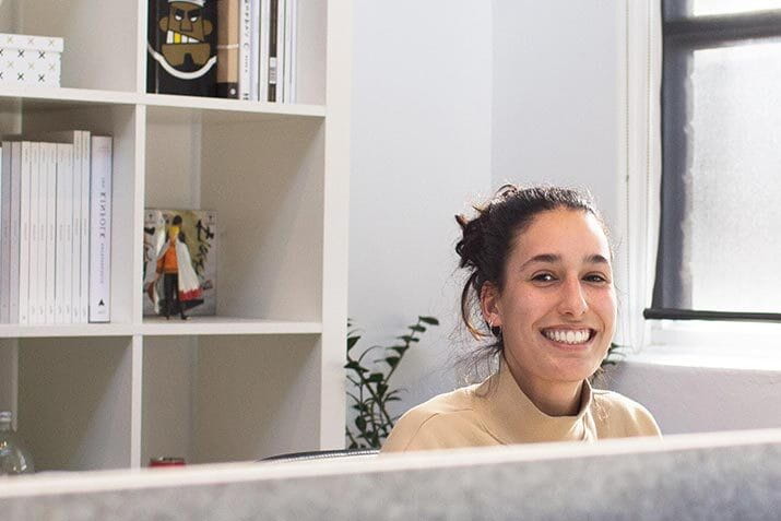 What to expect at the finish line_happy girl at desk