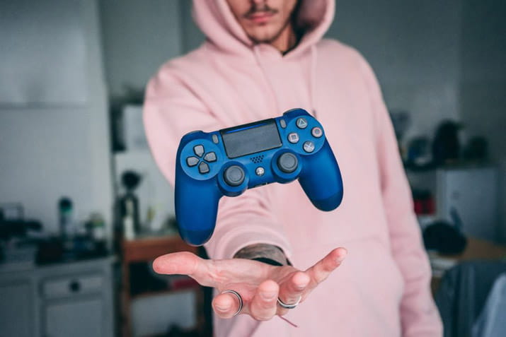 Man with game controller