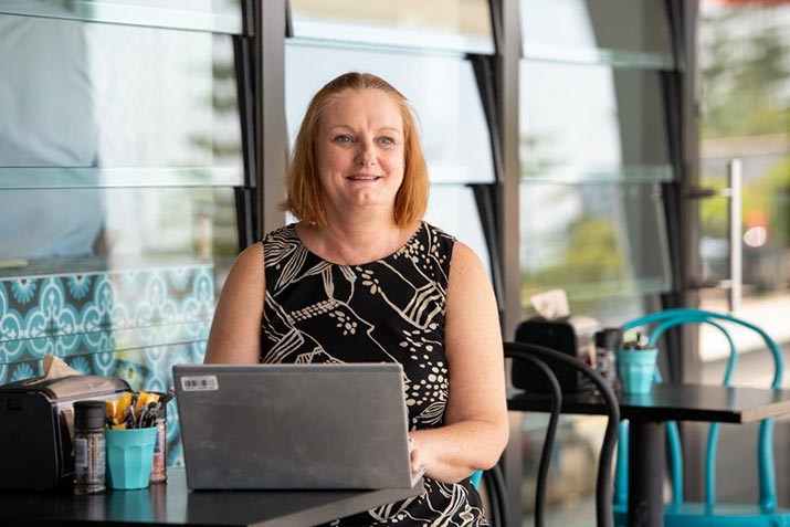 health-industry-management-student-kerrie-hurrell-studying-outdoor