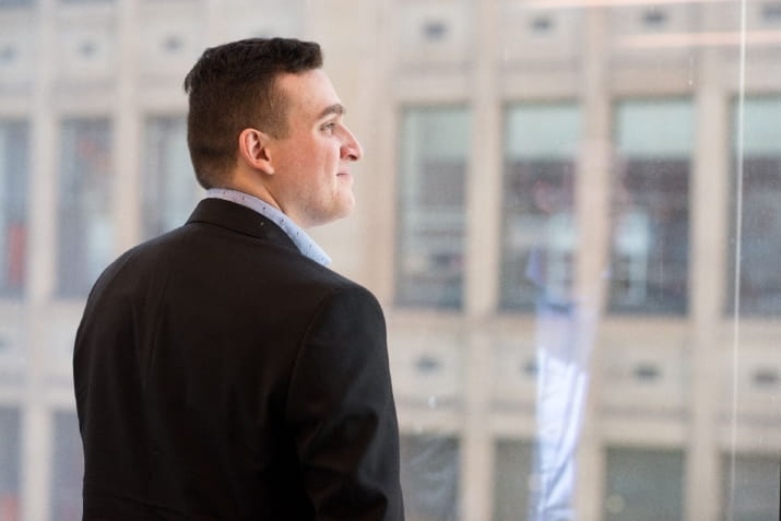 business-student-daniel-may-franks-looking-out-window