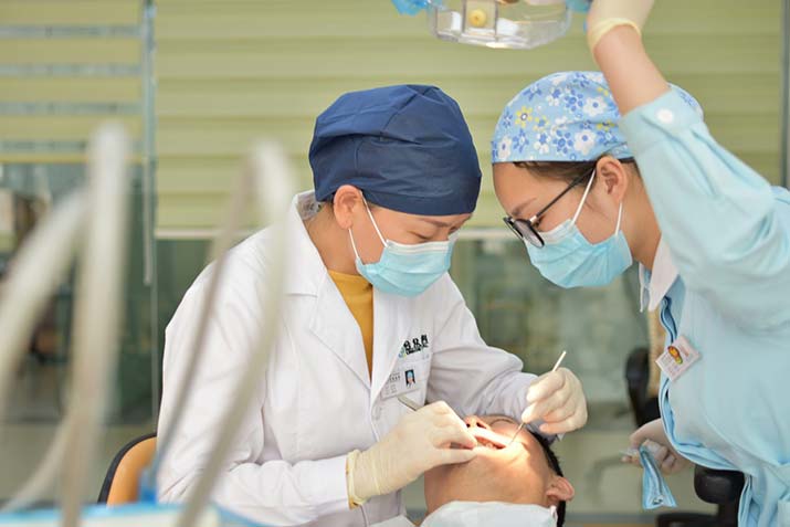 female dentist work