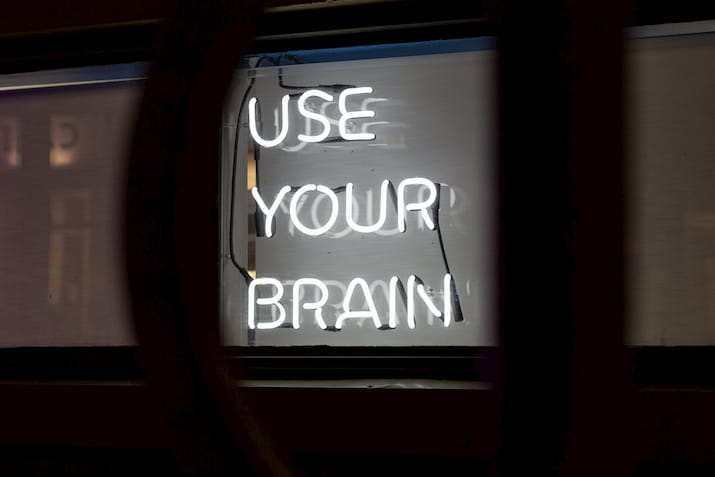 Neon sign with words use your brain