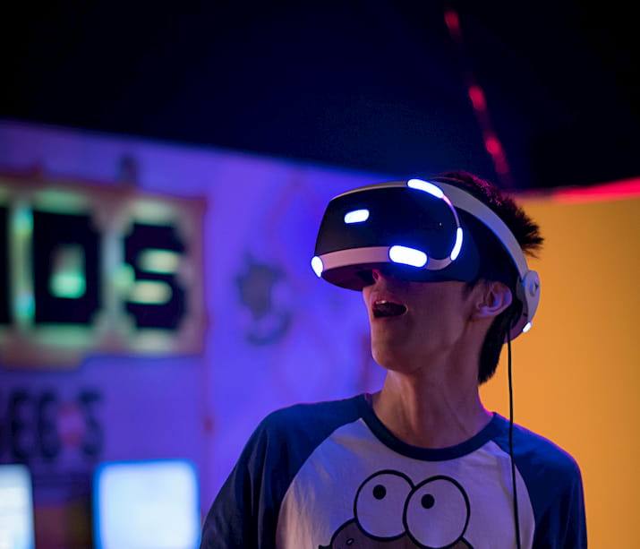 Young man wearing VR headset