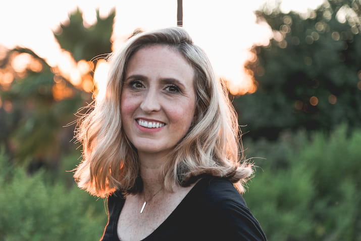 Middle aged woman smiling at camera