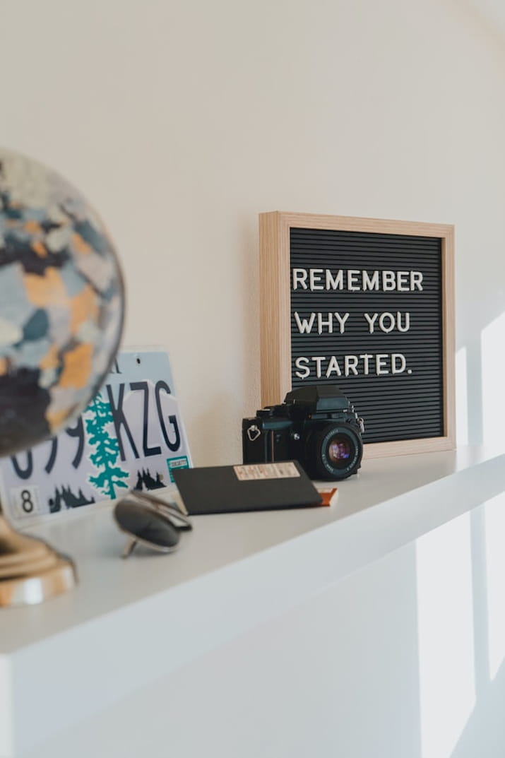 Desk with caption remember why you started