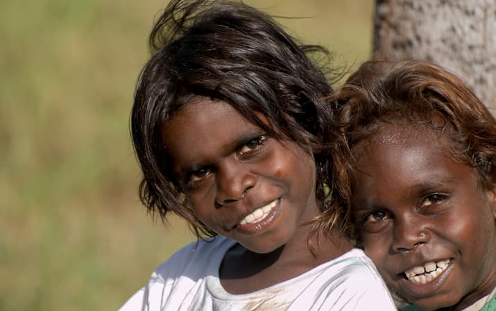 2 children looking at camera