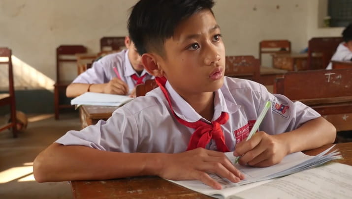 A young boy in a classroom