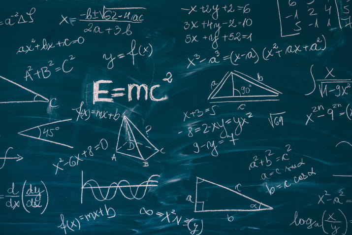 Mathematical equations on a blackboard