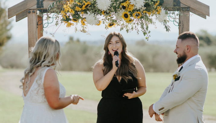 Annie-Lea Rowley officiating an outdoor wedding