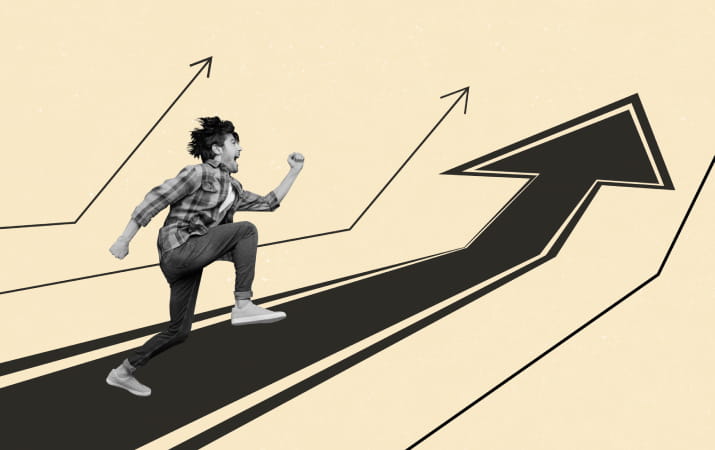 A happy man running along an arrow that points upward