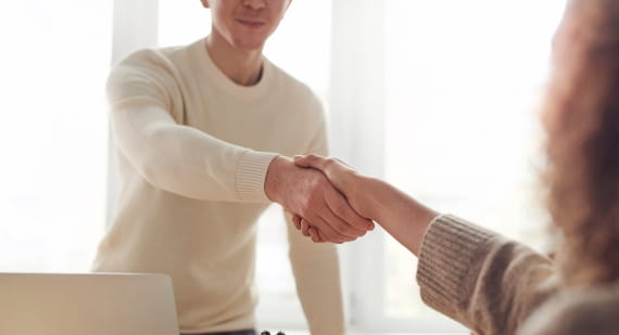Two people shaking hands