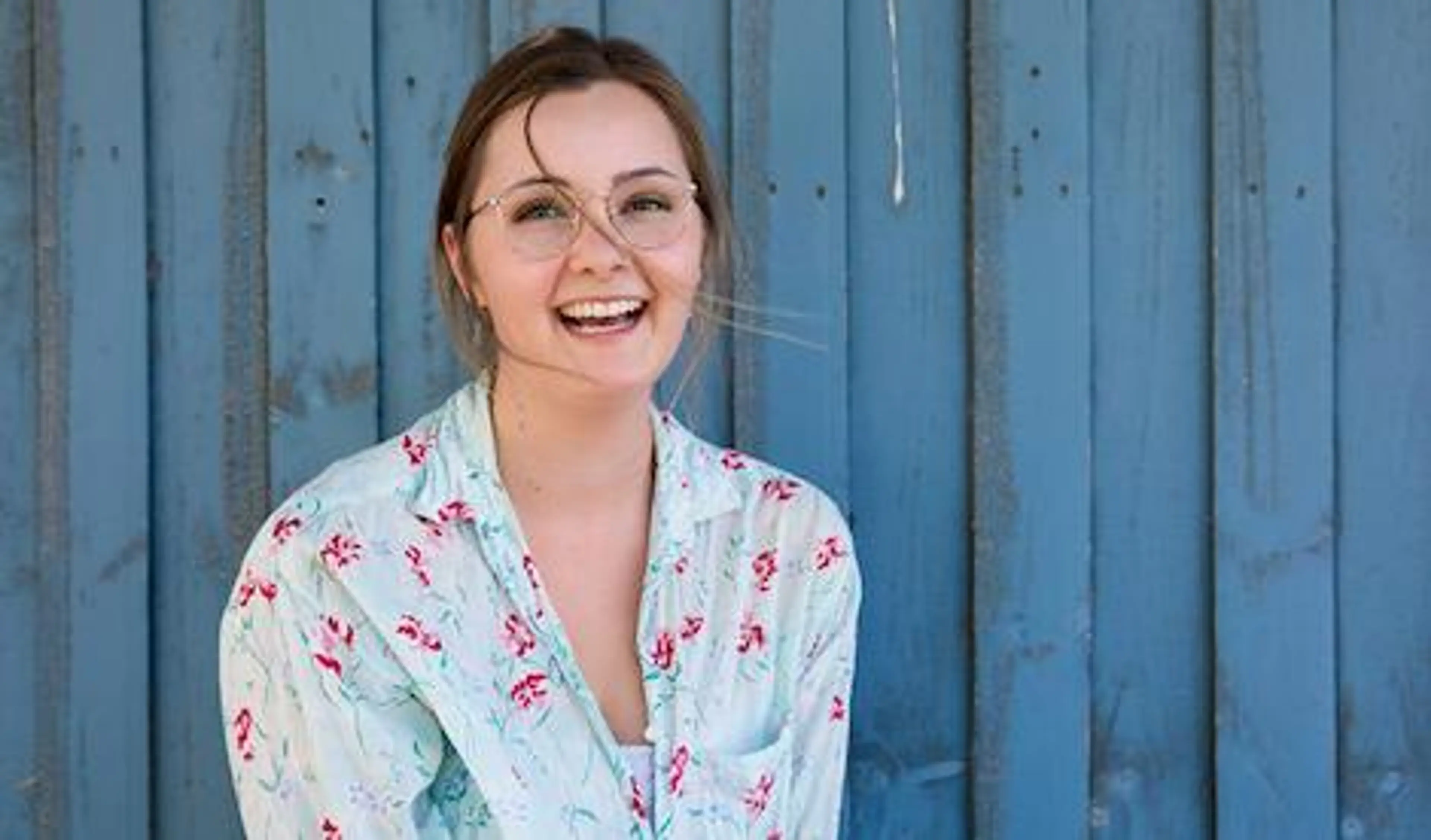 food-and-nutrition-student-anna-dewar-against-fence