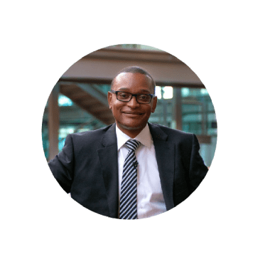 Open Universities Australia student, Edward, wearing a business suit.